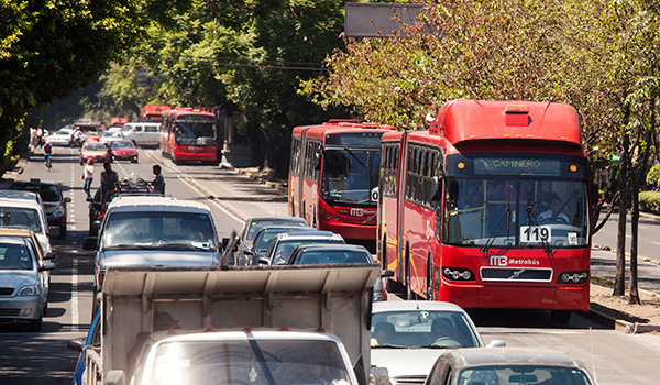 Mexico City Traffic showing five metrobuses